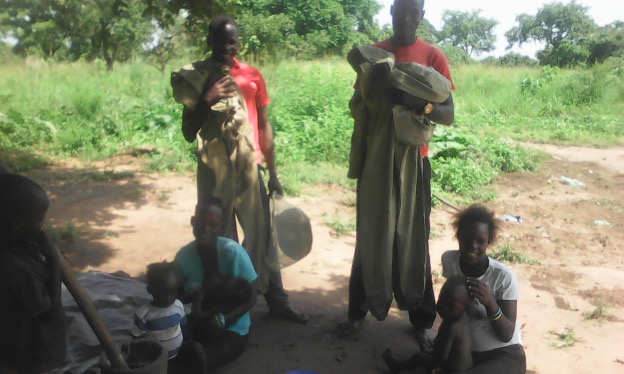 Members Receiving new harvesting suit they from HIVE Uganda